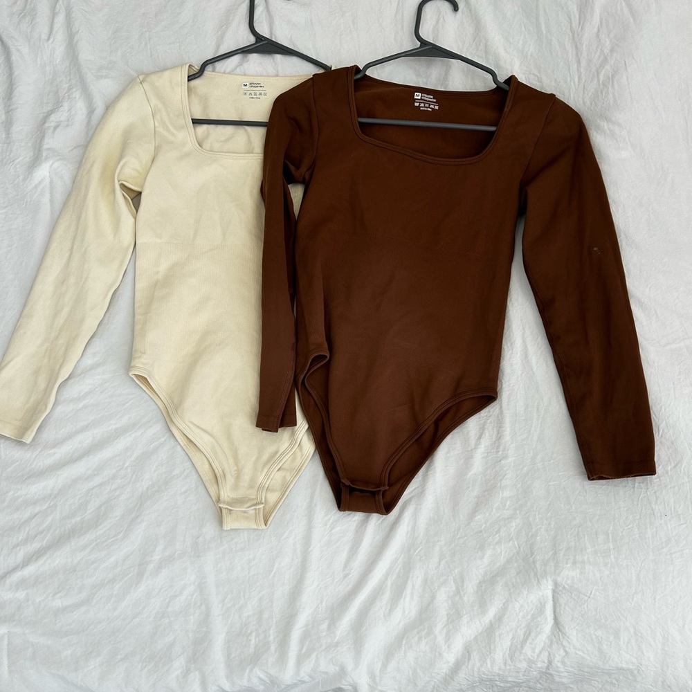 Qty 8 Short & long sleeve body suits size medium